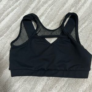 Five dancewear sports bra, size petite adult. Fits my youth size 8.